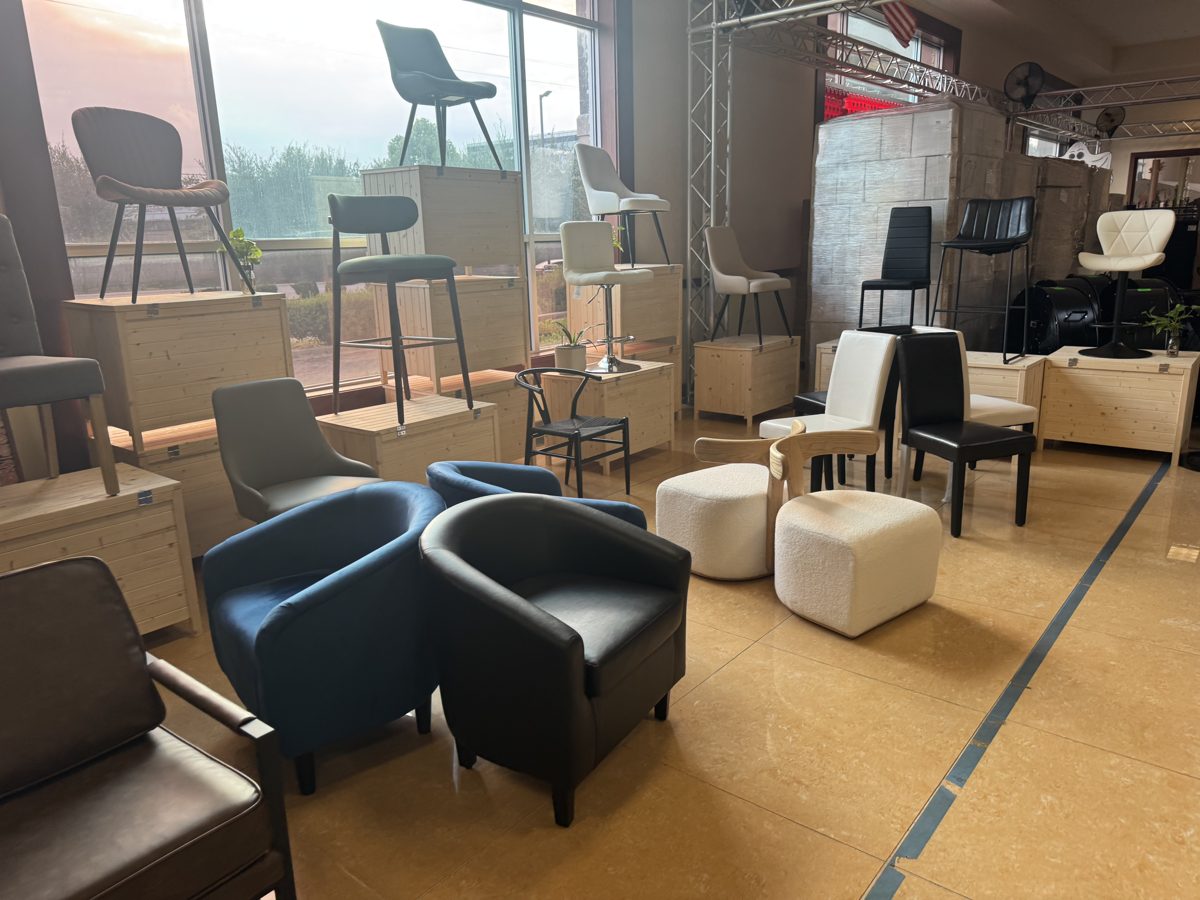 Armchairs, chairs and bar stools on the Cube-Age warehouse floor in Houston